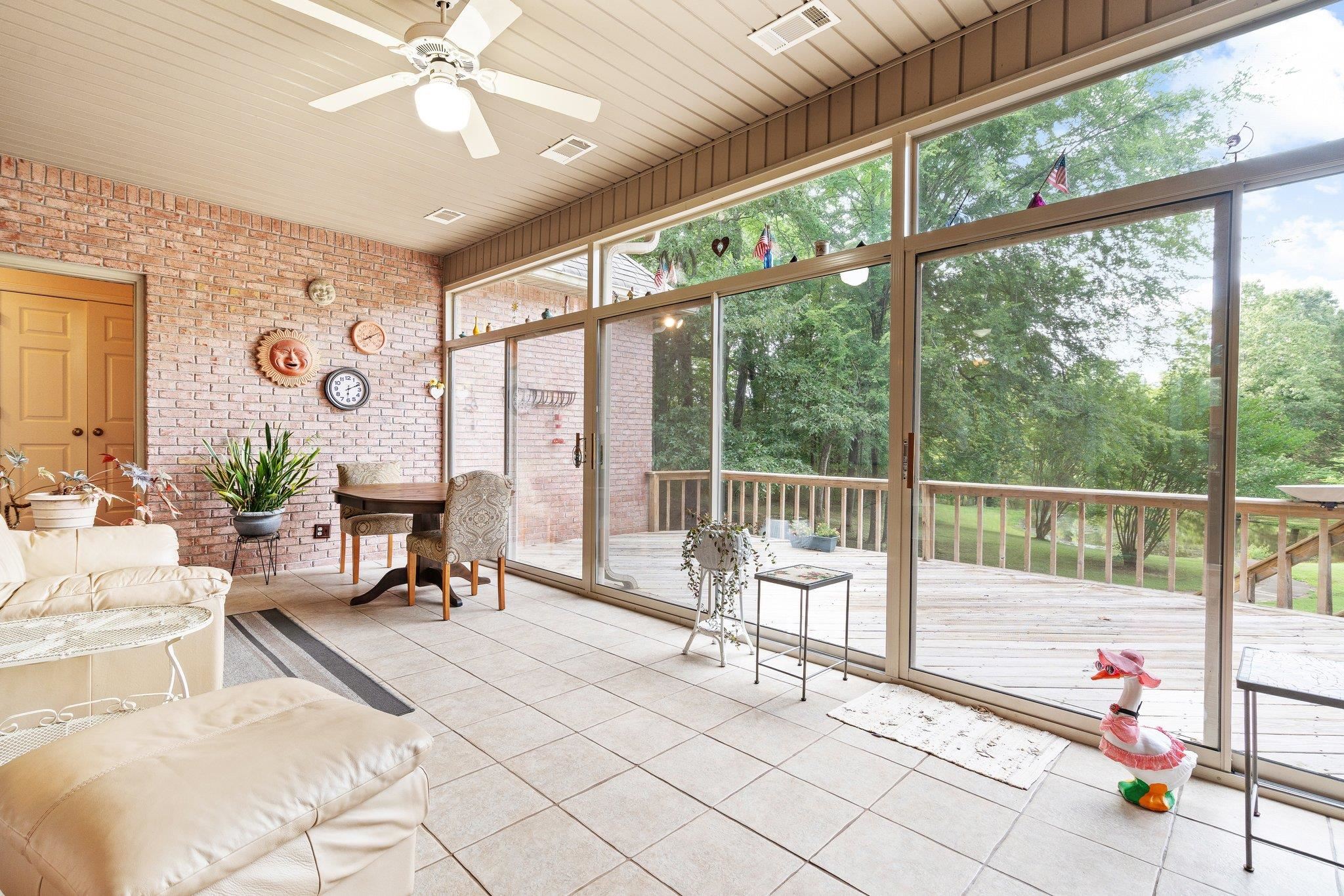 6500 State Line Road Memphis, TN 38141 - Photo 19 of 40 Sunroom / solarium with healthy amount of natural light and ceiling fan