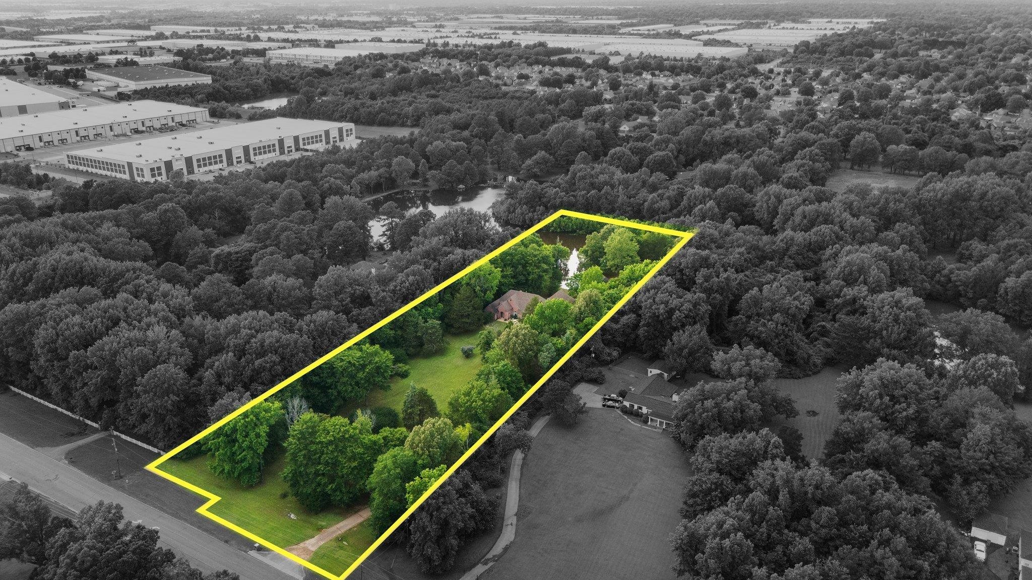 6500 State Line Road Memphis, TN 38141 - Photo 39 of 40 Aerial overview of property's location featuring a forest and property parcel outlined