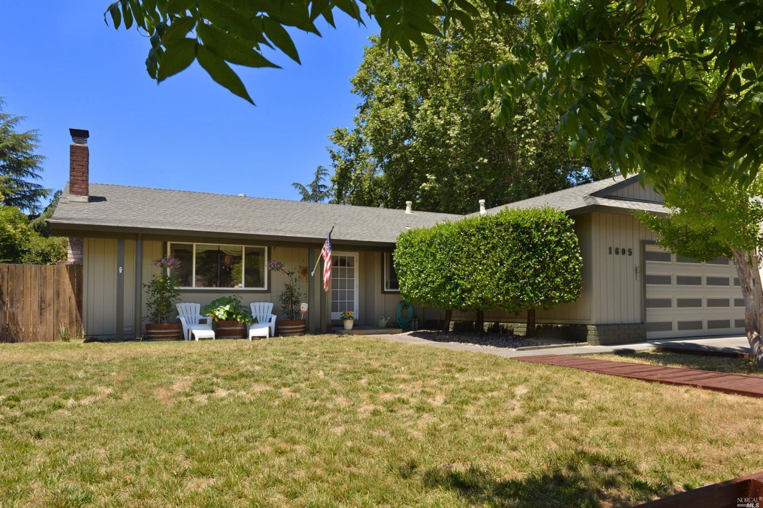 1605 Cunningham Way Santa Rosa, CA 95403 - Photo 1 of 1 a front view of a house with a yard