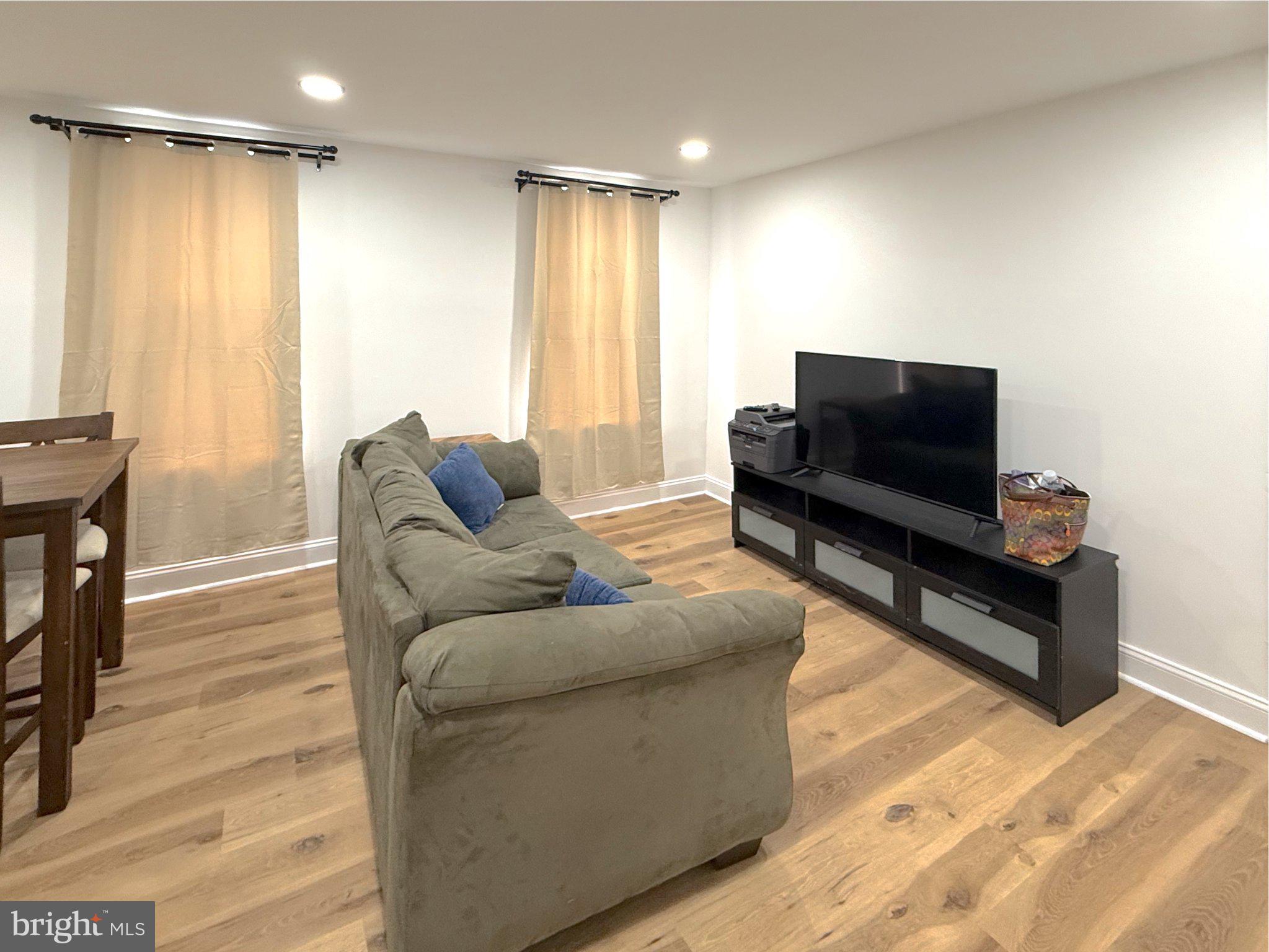 3703 6th Street, Unit 1 Baltimore, MD 21225 - Photo 5 of 12 Cozy living space with natural light.
