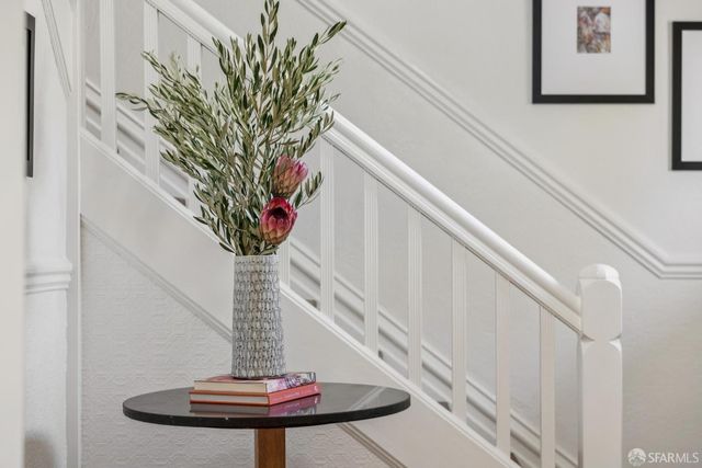 a vase of flowers sitting on a table