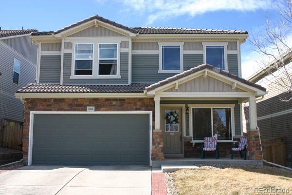 a view of a house with large windows