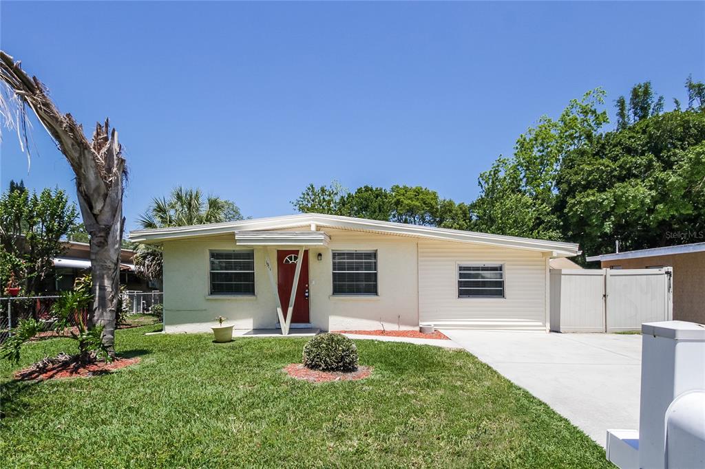 1911 3rd Avenue East Bradenton, FL 34208 - Photo 1 of 15 a view of a house with backyard and garden