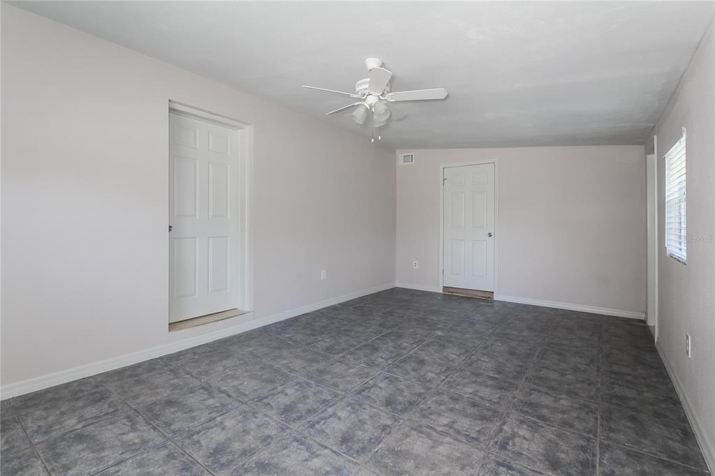 1911 3rd Avenue East Bradenton, FL 34208 - Photo 8 of 15 an empty room with fan and windows