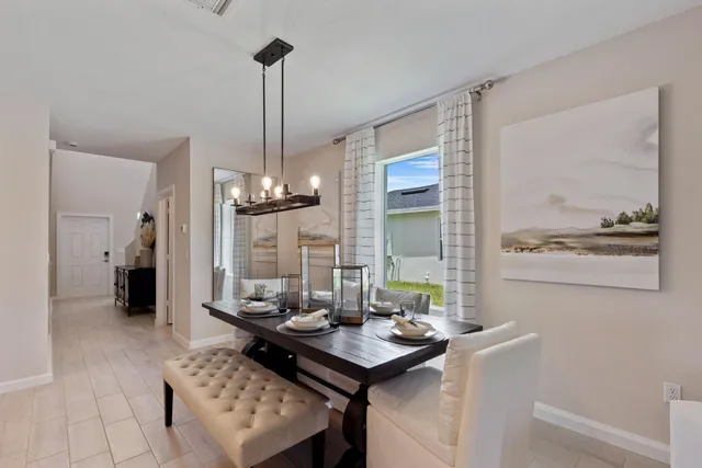 a view of a dining room with furniture