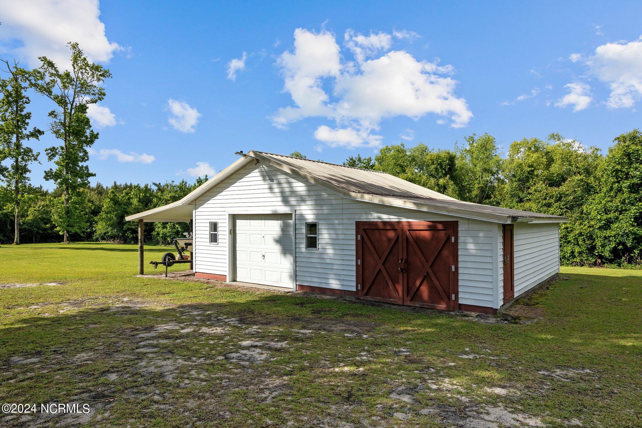 6655 River Road Vanceboro, NC 28586 - Photo 16 of 43 detached 1-car garage & workshop