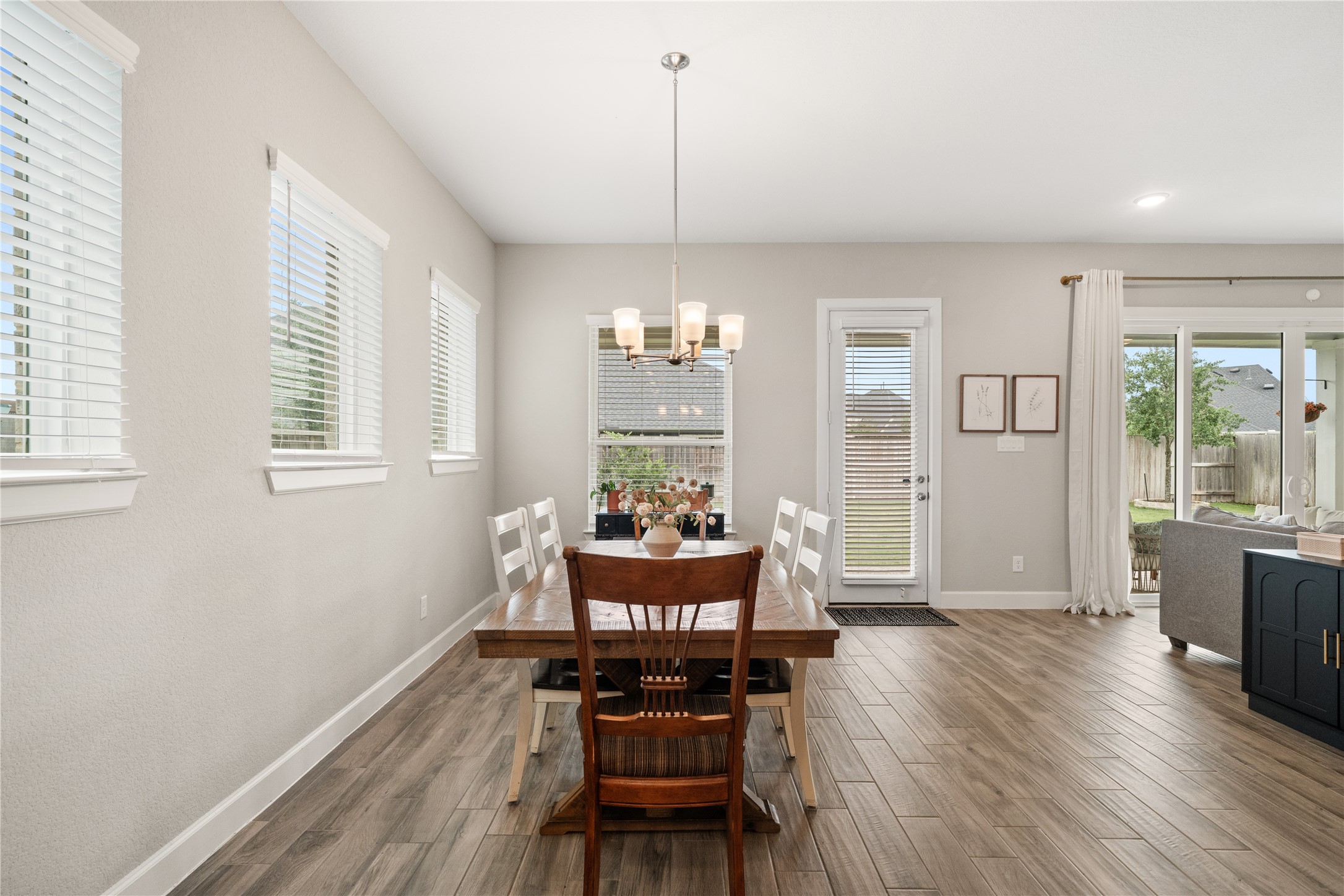 3118 Swift Way Katy, TX 77493 - Photo 7 of 34 Kitchen & Living Open Concept – The kitchen seamlessly flows into the living area, creating an inviting space ideal for gatherings and everyday living.