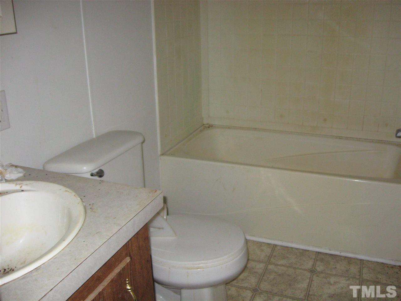 Bathroom in the hall between two bedrooms.