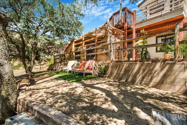 a view of a building with a yard