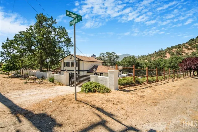 a house with yard in front of it