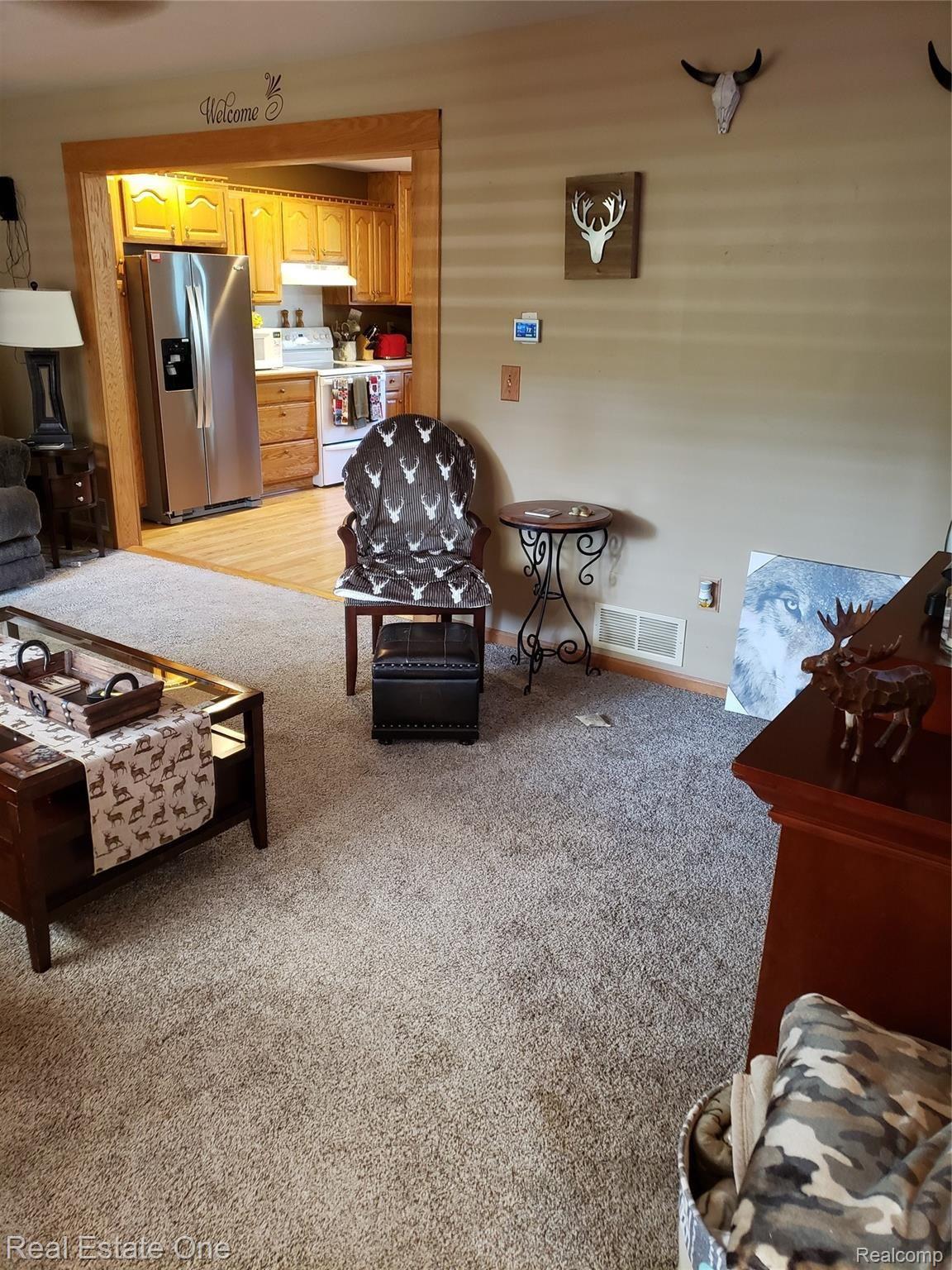 4708 Klam Road Columbiaville, MI 48421 - Photo 9 of 61 klam living room 2.jpg