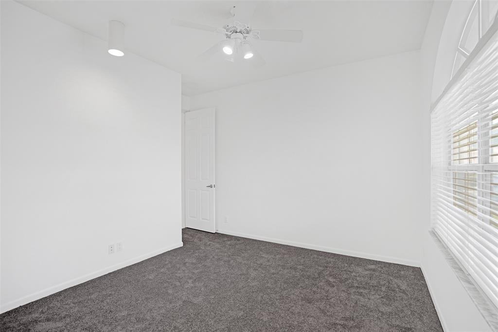 6463 Colomera Drive Boca Raton, FL 33433 - Photo 20 of 29 an empty room with windows