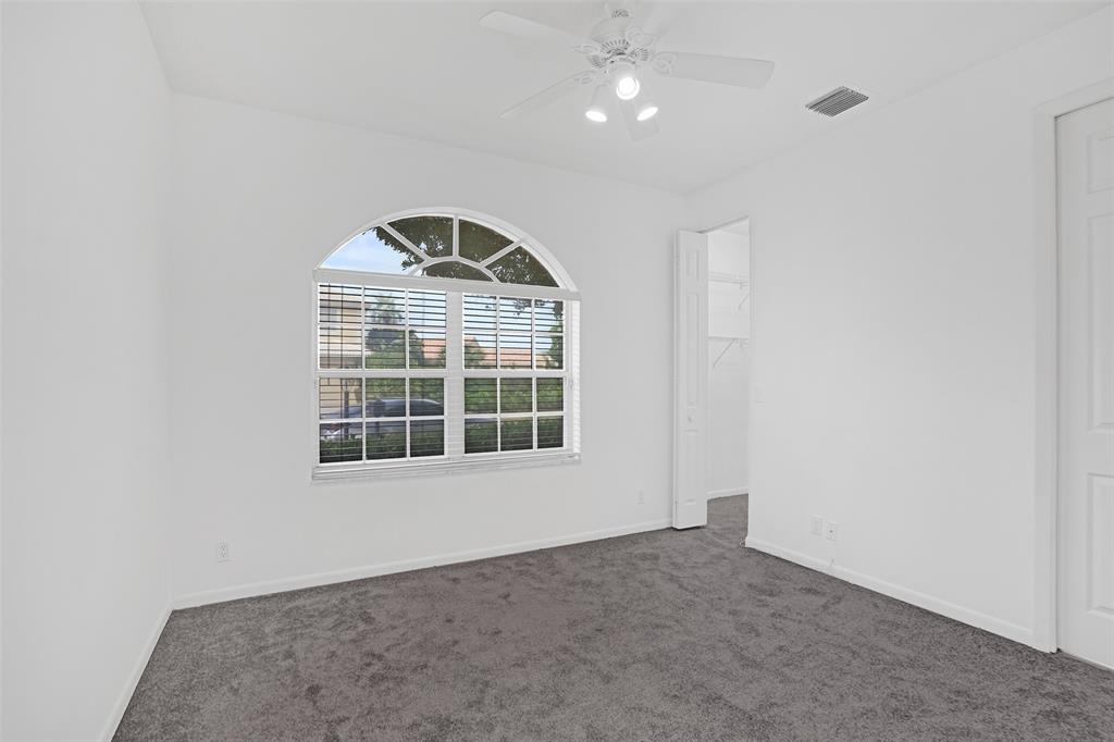 6463 Colomera Drive Boca Raton, FL 33433 - Photo 21 of 29 an empty room with a window