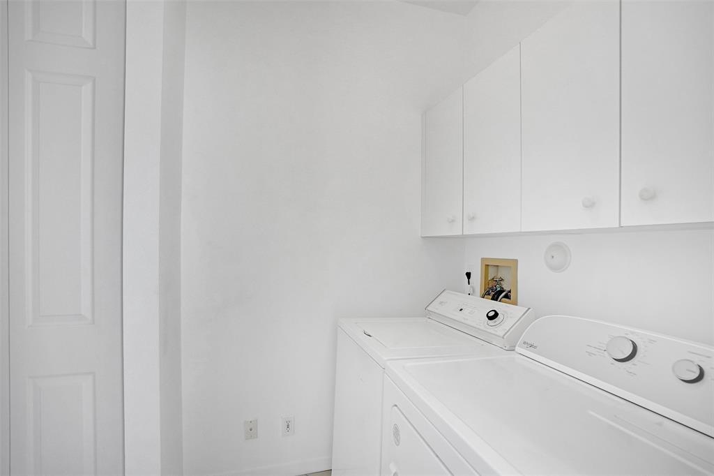 6463 Colomera Drive Boca Raton, FL 33433 - Photo 25 of 29 a utility room with dryer and washer