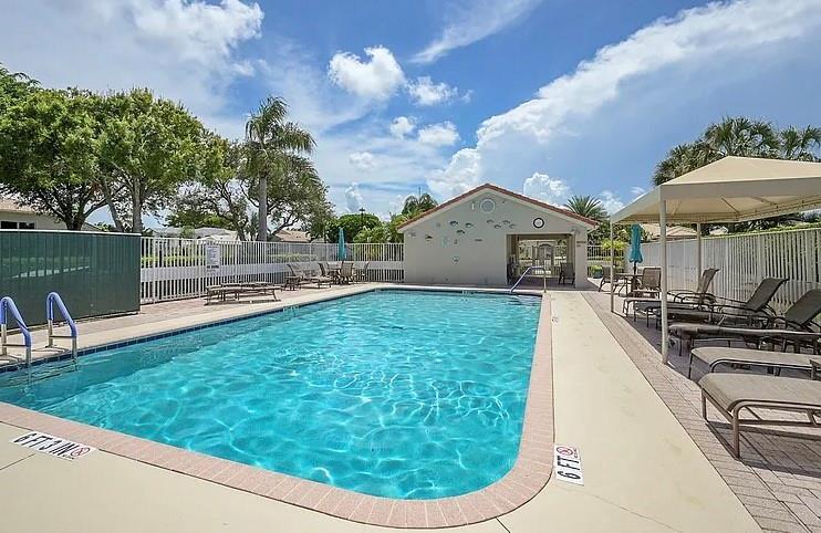 6463 Colomera Drive Boca Raton, FL 33433 - Photo 28 of 29 a view of a swimming pool with a patio
