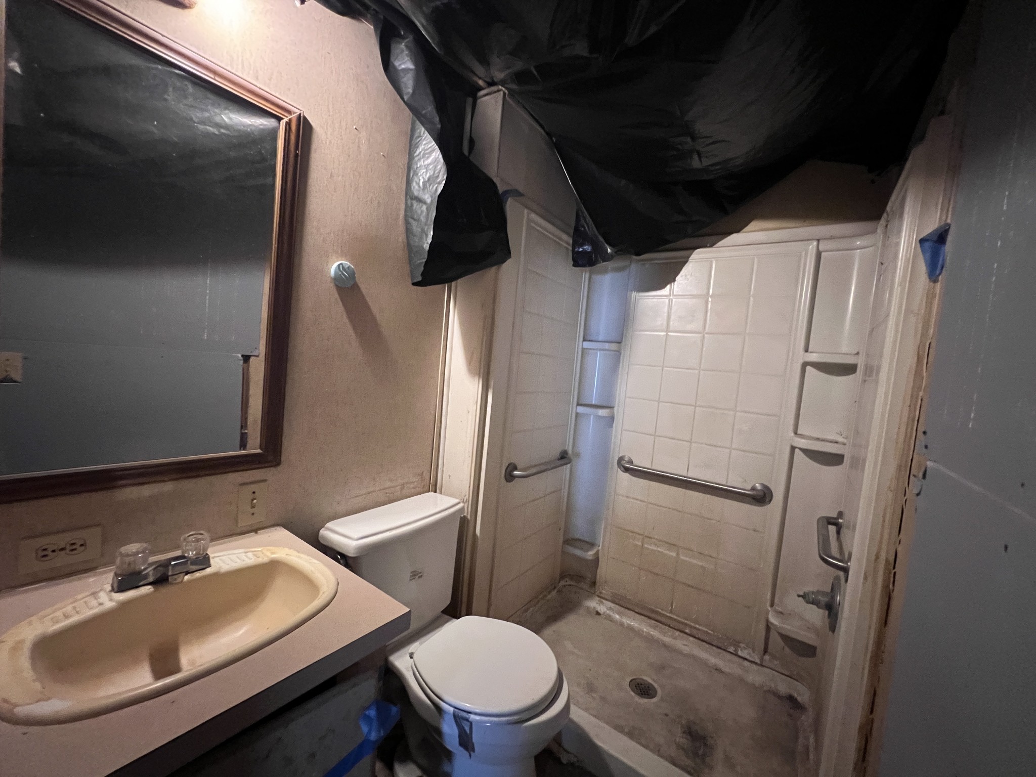 616 Powell Street Paris, TN 38242 - Photo 19 of 26 a bathroom with a sink toilet and shower
