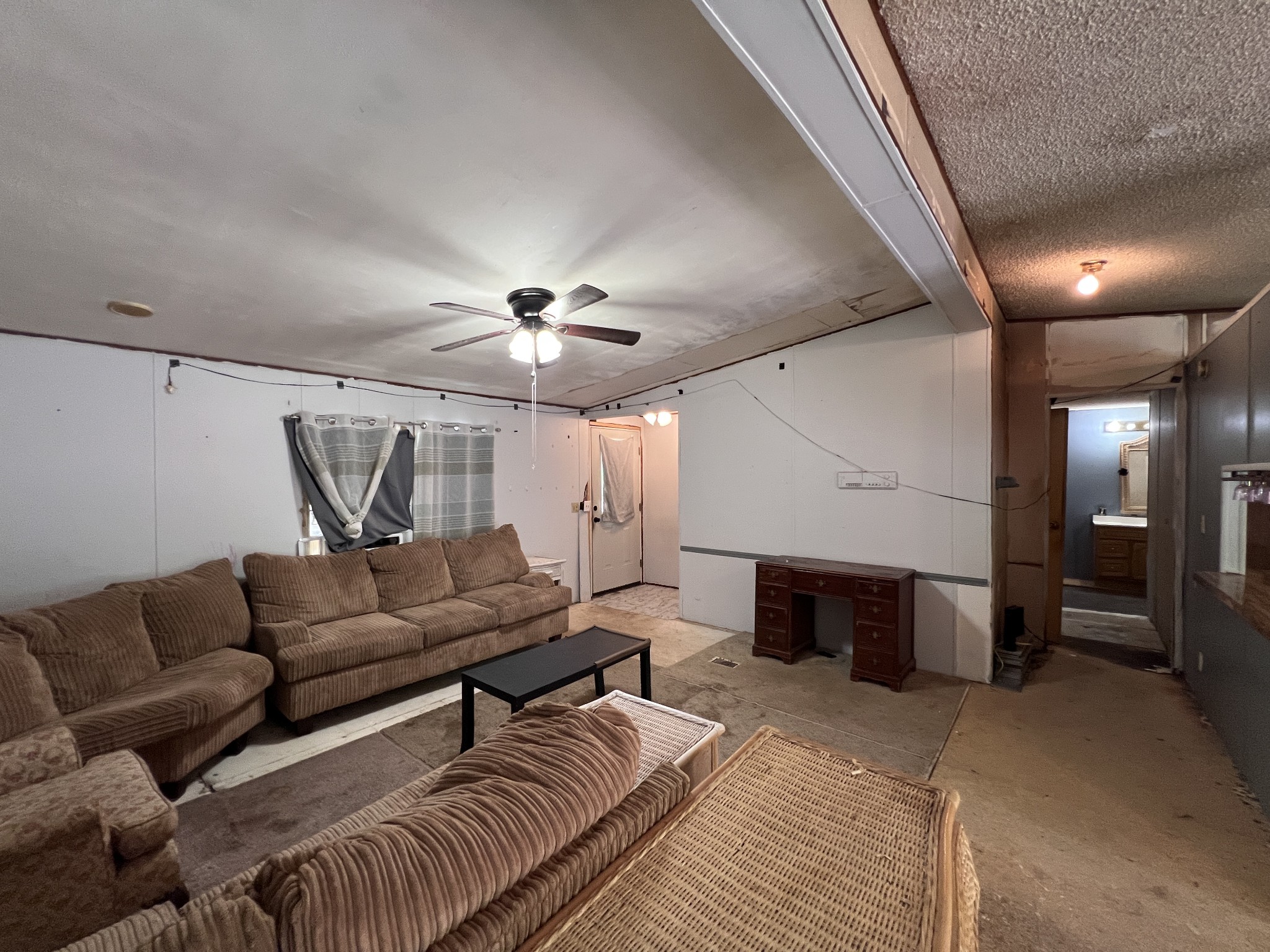 616 Powell Street Paris, TN 38242 - Photo 9 of 26 a living room with furniture and a wooden floor