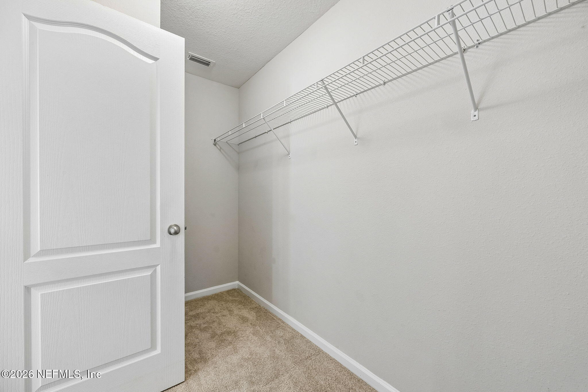 65908 Edgewater Drive Yulee, FL 32097 - Photo 19 of 49 Primary Closet