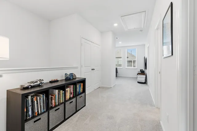 a bedroom with a bed and a view of bathroom