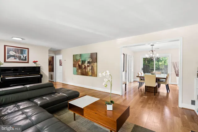 a kitchen with a refrigerator a stove and a sink