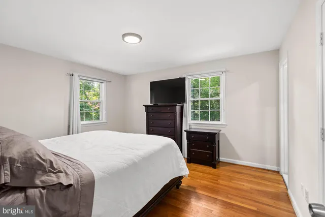 a view of a bathroom with a sink and a mirror