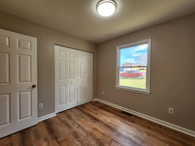 an empty room with windows