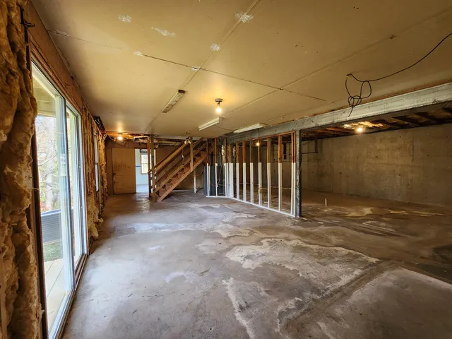 a view of staircase and storage