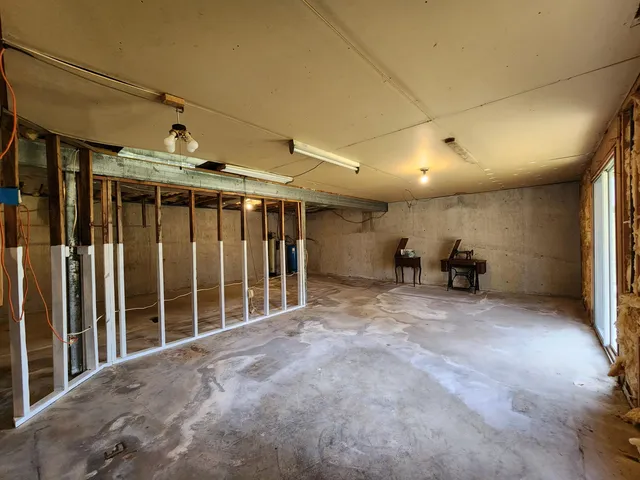 a view of empty room with windows