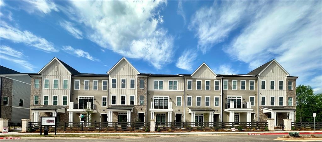 518 Alice Way, Unit D13 Cumming, GA 30040 - Photo 21 of 51 a front view of a multi story building