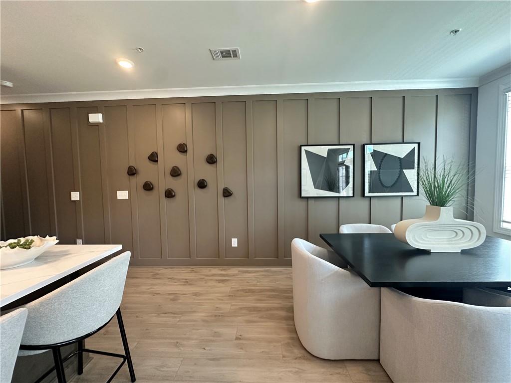 518 Alice Way, Unit D13 Cumming, GA 30040 - Photo 7 of 51 a living room with furniture and lamp