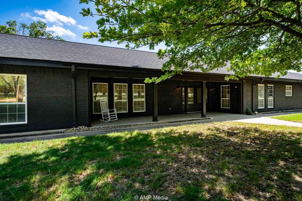a view of a house with a garden