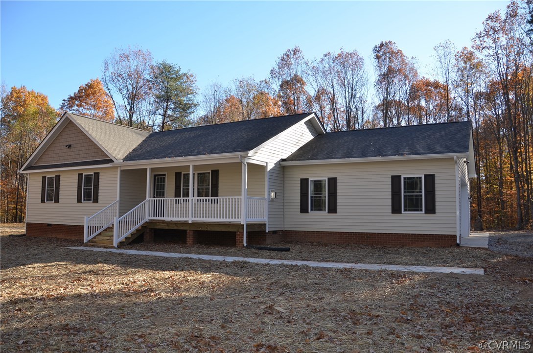 1118 Signboard Road Bumpass, VA 23024 - Photo 1 of 26 a front view of a house with a yard