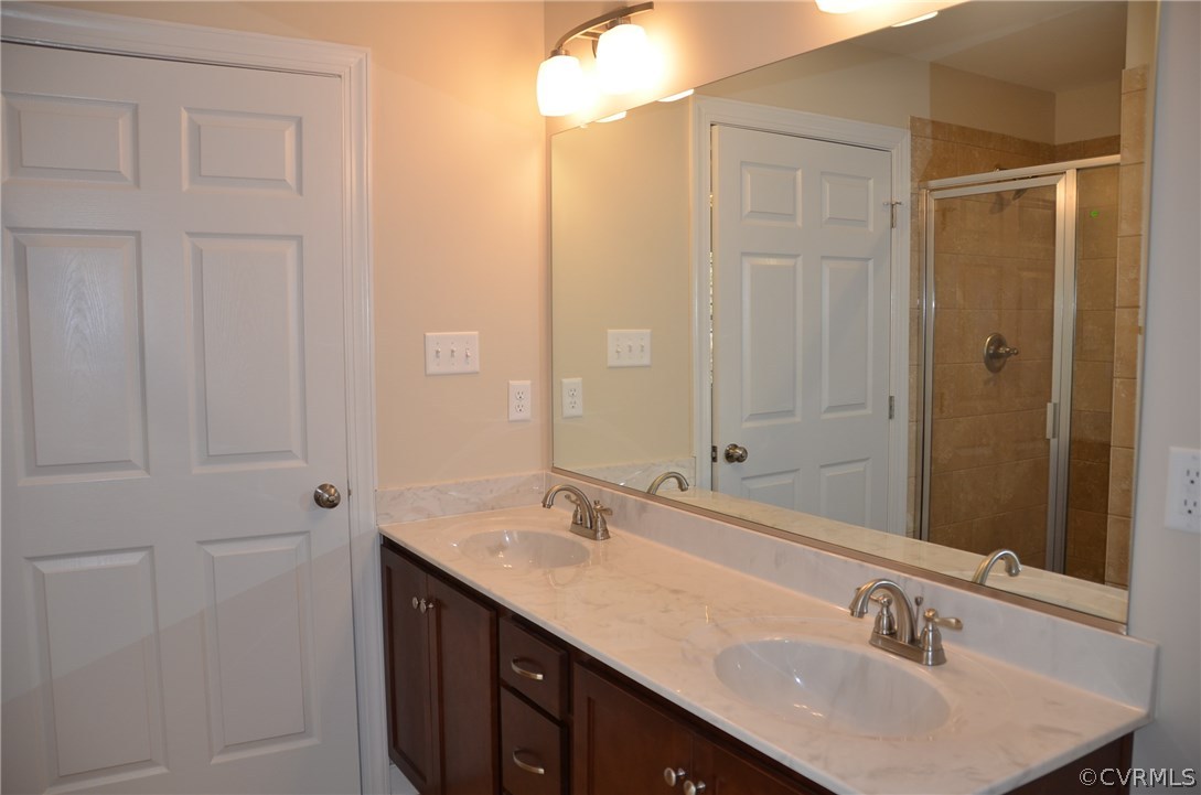 1118 Signboard Road Bumpass, VA 23024 - Photo 12 of 26 a bathroom with a sink and a mirror
