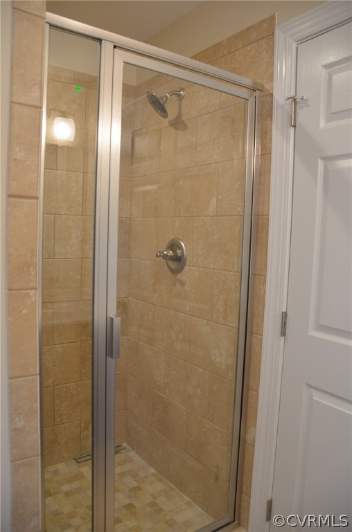 1118 Signboard Road Bumpass, VA 23024 - Photo 14 of 26 a bathroom with a glass shower door