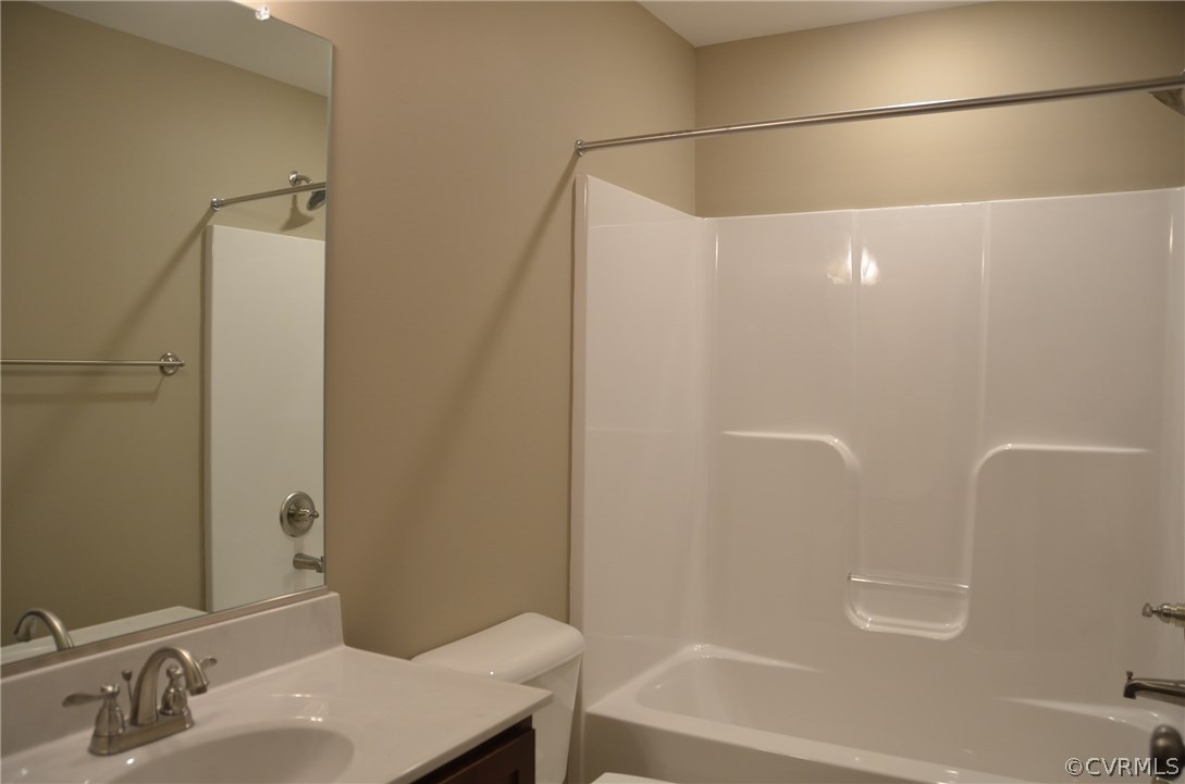 1118 Signboard Road Bumpass, VA 23024 - Photo 19 of 26 a bathroom with a sink and shower