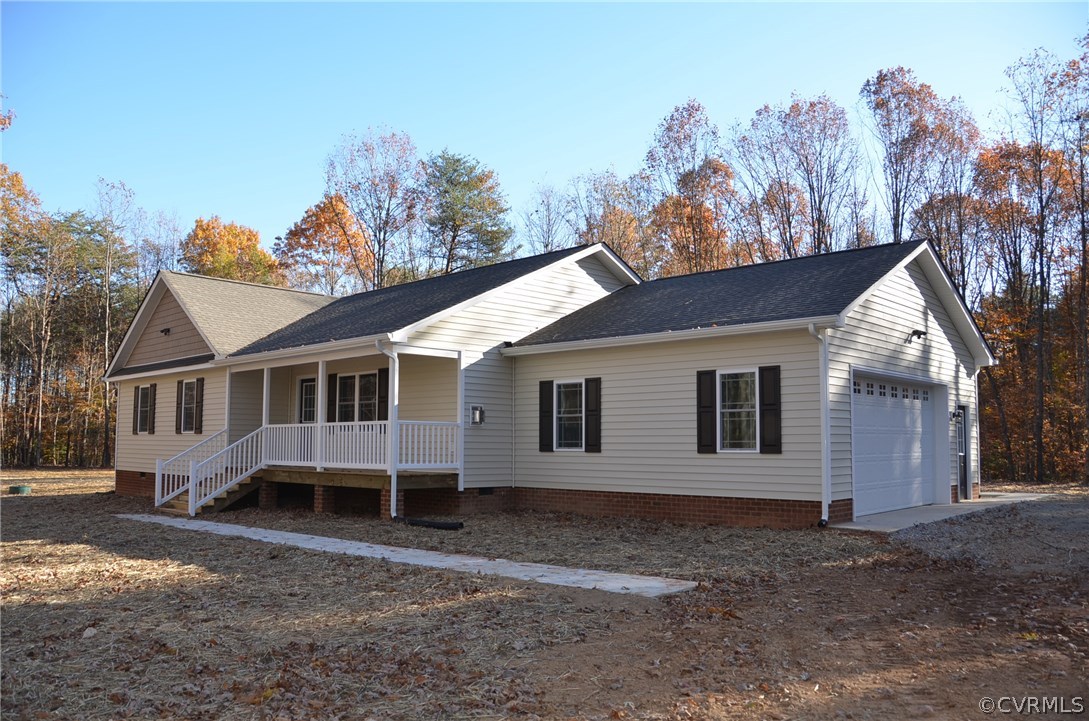 1118 Signboard Road Bumpass, VA 23024 - Photo 2 of 26 front view of a house with a yard