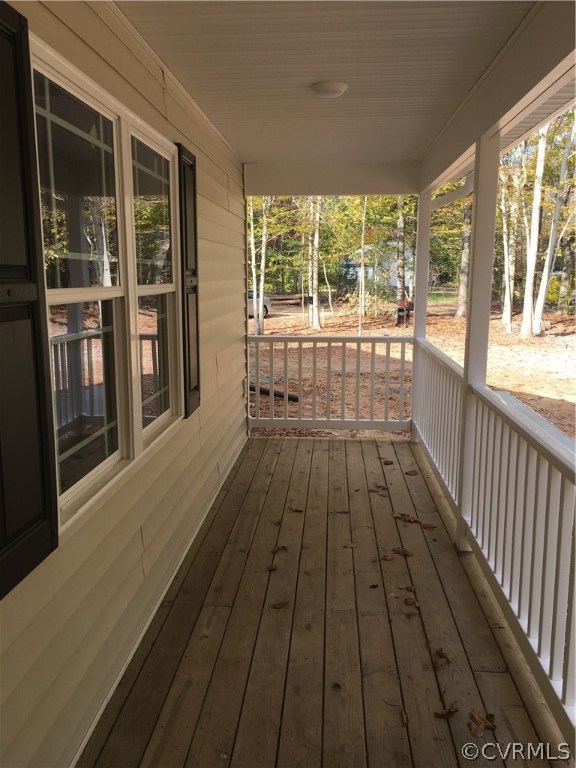 1118 Signboard Road Bumpass, VA 23024 - Photo 22 of 26 a view of a balcony with wooden floor