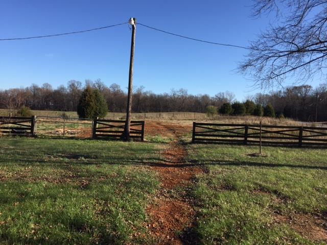 Acreage to the side of house - mostly fenced