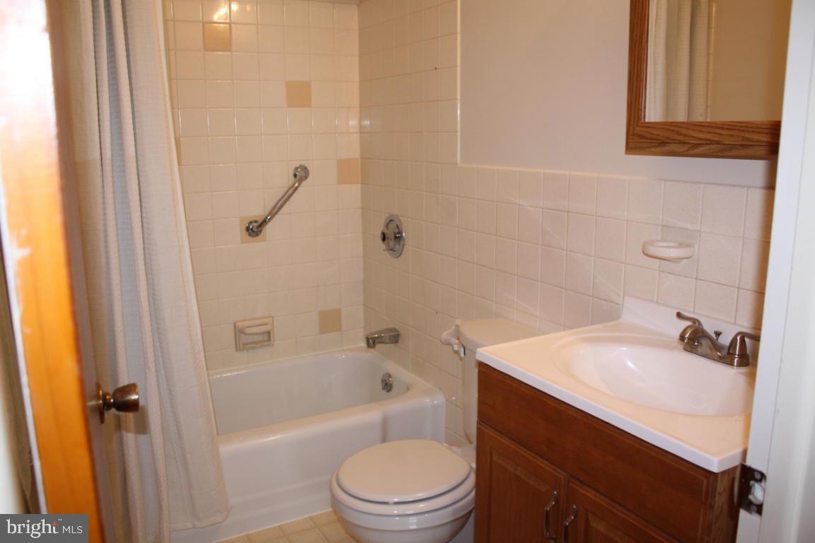 503 West Marion Street Lititz, PA 17543 - Photo 8 of 10 a bathroom with a sink a toilet and shower