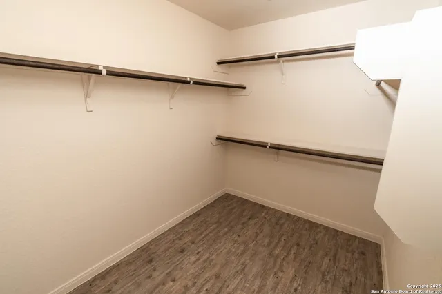 a view of a room with racks on the wall