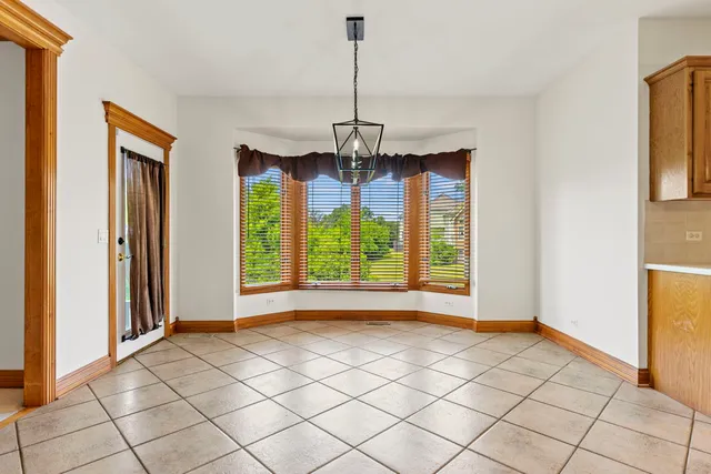 a view of a room with window chandelier and window