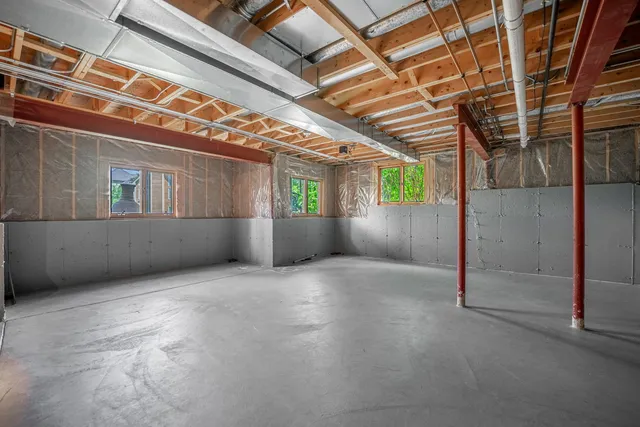 an empty room with windows