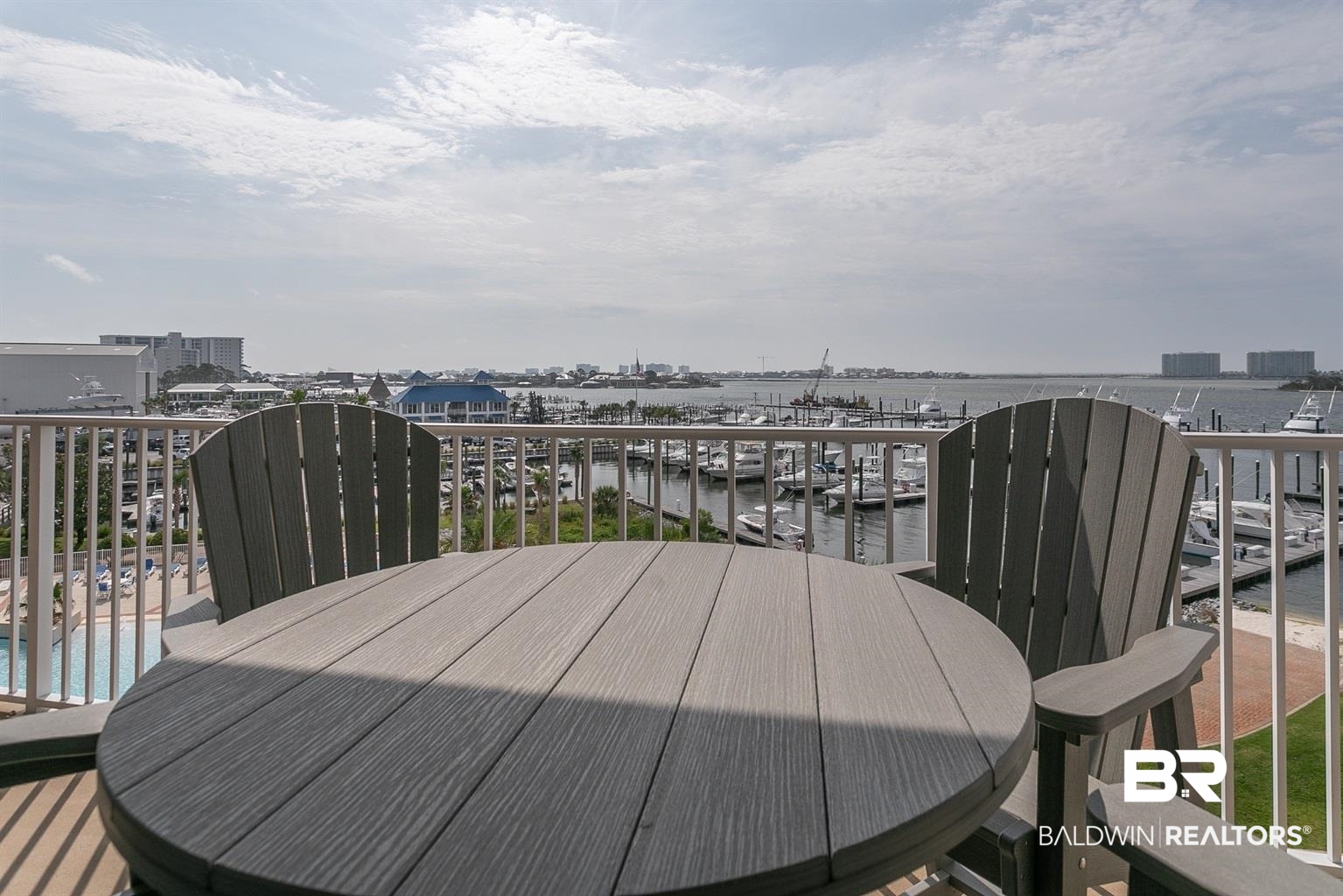 27800 Canal Road, Unit 411 Orange Beach, AL 36561 - Photo 28 of 49 Expansive balcony featuring a white railing and composite deck flooring
