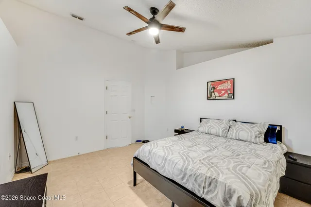 a bathroom with a sink mirror and toilet
