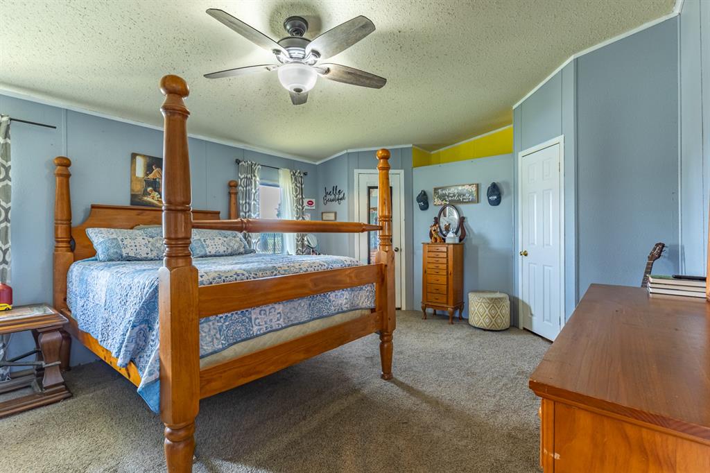 75 Southern Road Mineral Wells, TX 76067 - Photo 13 of 31 a view of a bedroom with furniture