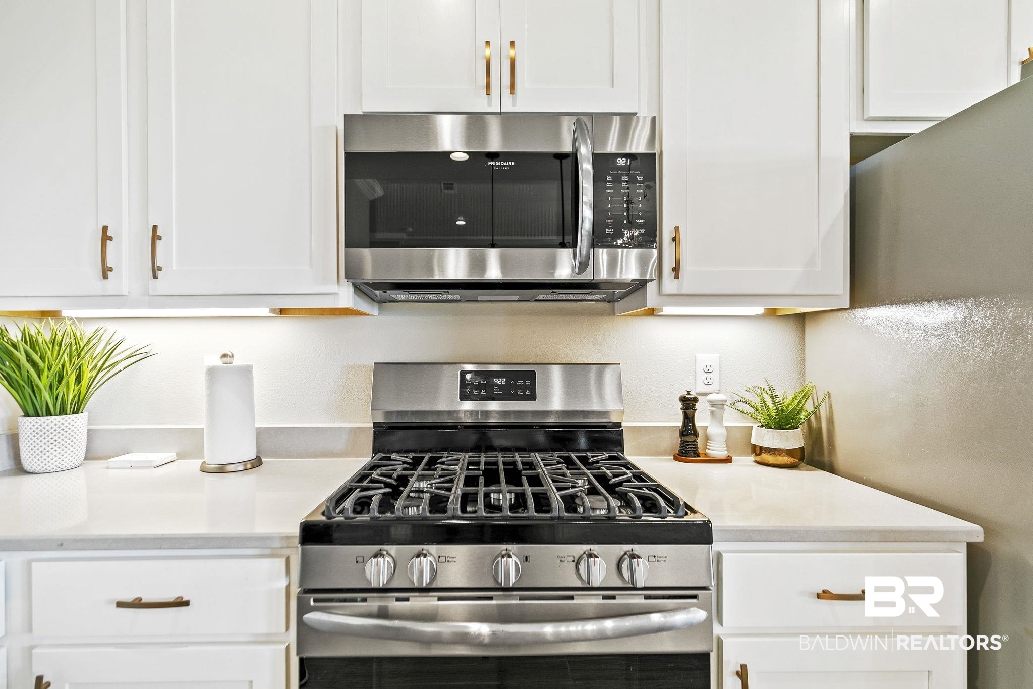 10140 Chipper Lane Foley, AL 36535 - Photo 21 of 72 Kitchen featuring white cabinetry and stainless steel appliances