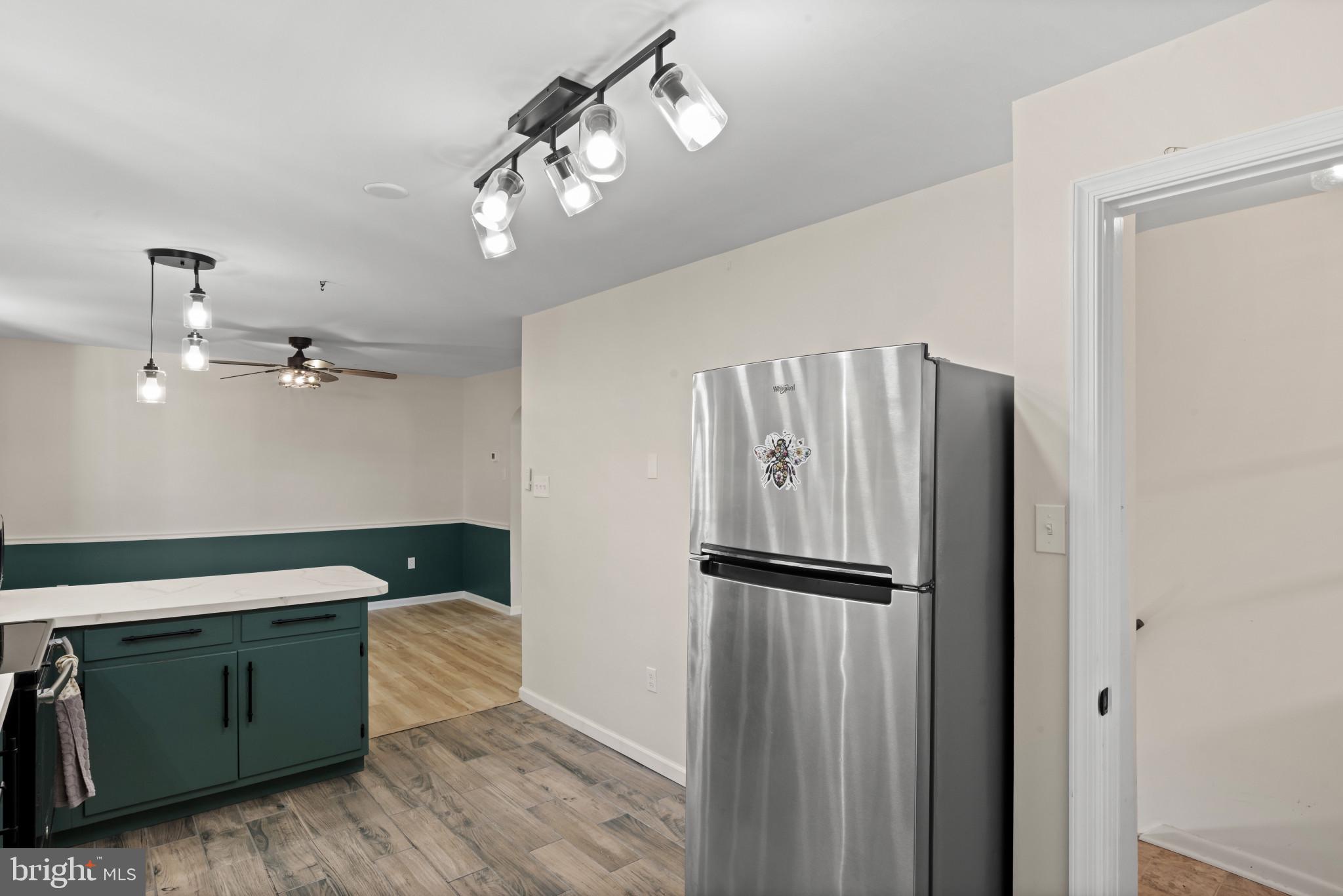 14 Sharon Road Enola, PA 17025 - Photo 13 of 40 Kitchen area featuring wood-finish flooring, stain
