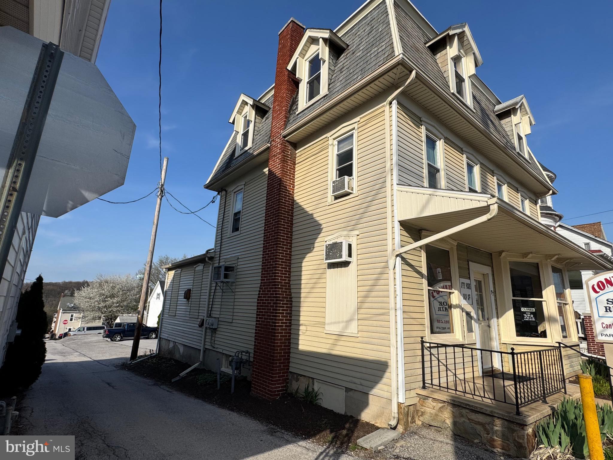 37 West Main Street Dallastown, PA 17313 - Photo 2 of 9 a front view of a house