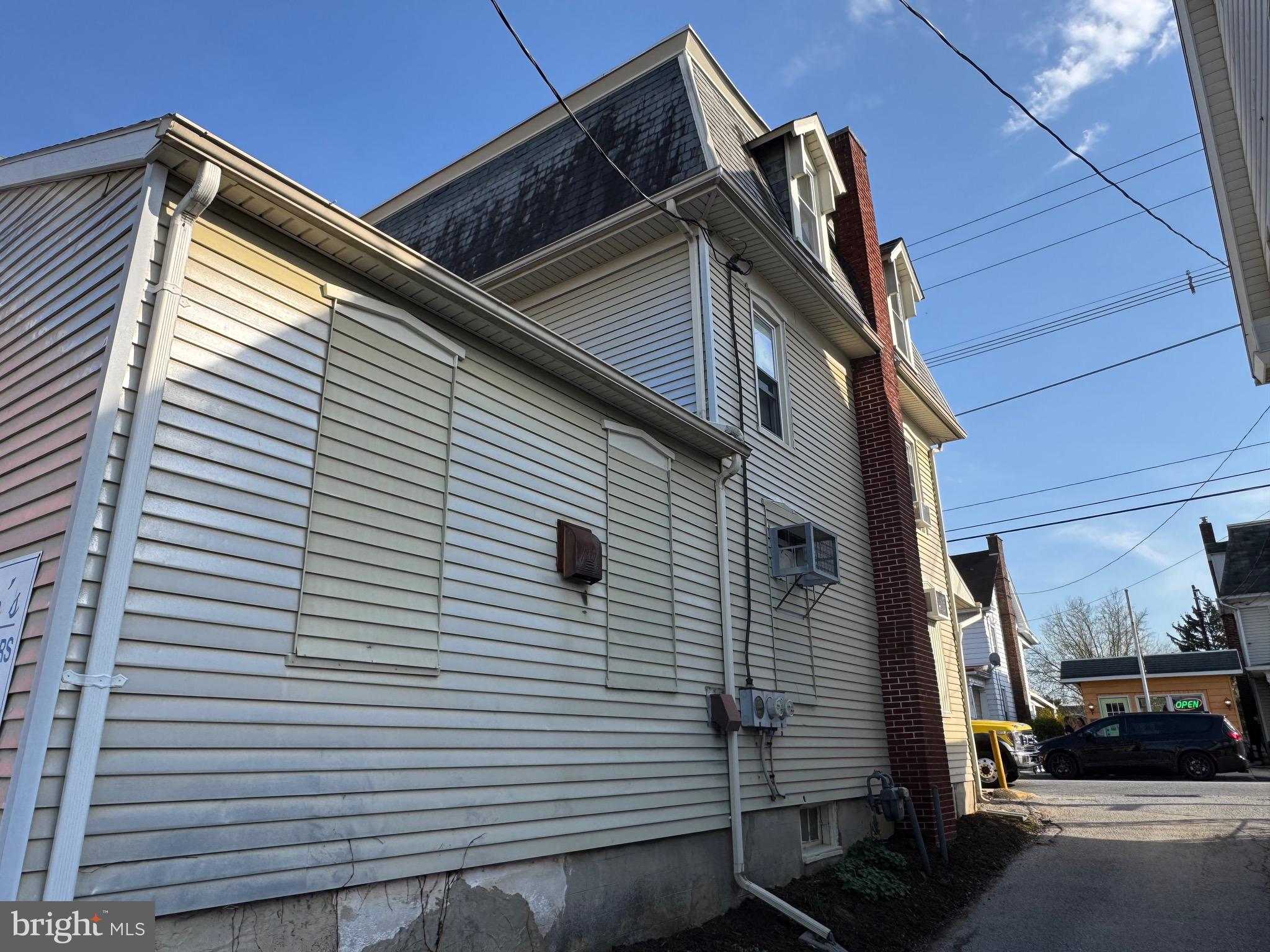 37 West Main Street Dallastown, PA 17313 - Photo 4 of 9 a view of building with cars