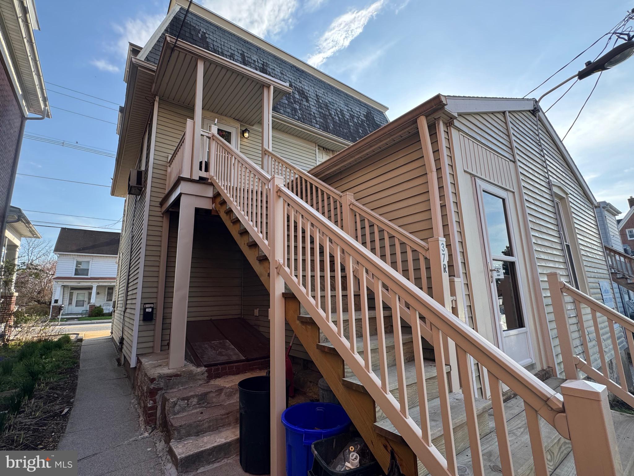 37 West Main Street Dallastown, PA 17313 - Photo 8 of 9 a view of a house with wooden stairs